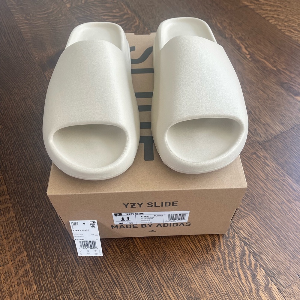Adidas Yeezy slides. Mens size 11. Bone color. New in box. Never tried on